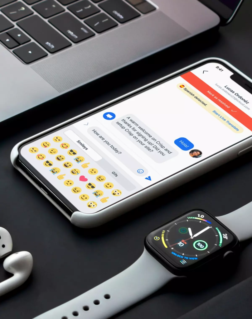 Crisp app mockup shown on a phone by BB Agency next to an apple watch and laptop